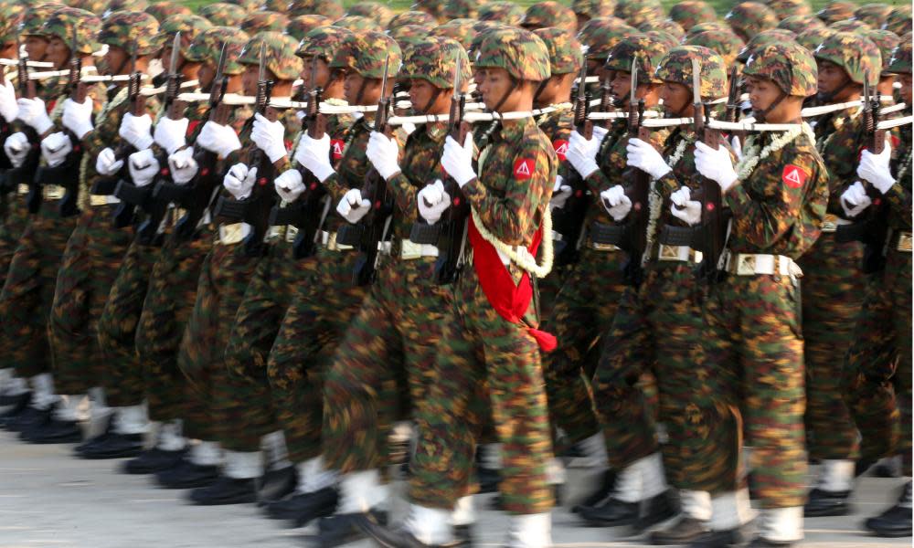 Soldiers march on Armed Forces Day on 27 March 2018