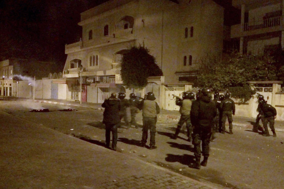 Tunisian Police officers patrol after clashes in the streets of Kasserine, southern of Tunisia, Tuesday, Dec 25, 2018.The death of a Tunisian journalist Abderrak Zorgui who set himself on fire to protest economic problems in the North African nation prompted a protest that led to clashes with police and nationwide concern. (AP Photo/Mohamed Ben Salah)