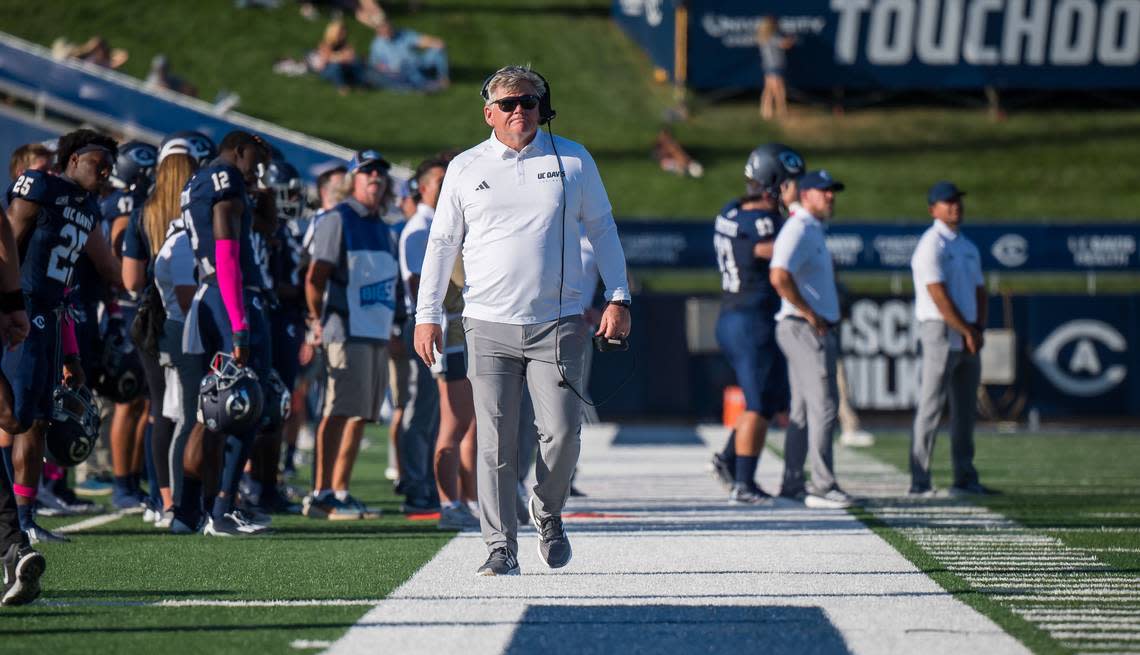 UC Davis Aggies head coach Dan Hawkins walks the sideline during a timeout in the first half as they play the Montana Grizzlies at the NCAA college football game Saturday, Oct. 7, 2023, at UC Davis Health Stadium. Xavier Mascareñas/Sacramento Bee file