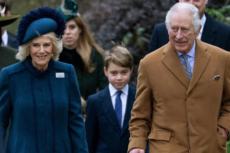 Mark Cuthbert/UK Press via Getty Queen Camilla, Prince George and King Charles