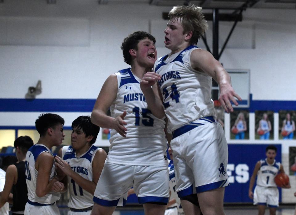 Olton celebrates their win against Floydada in a District 4-2A boys basketball game, Friday, Jan. 13, 2023, at Olton Memorial Gymnasium in Olton. 