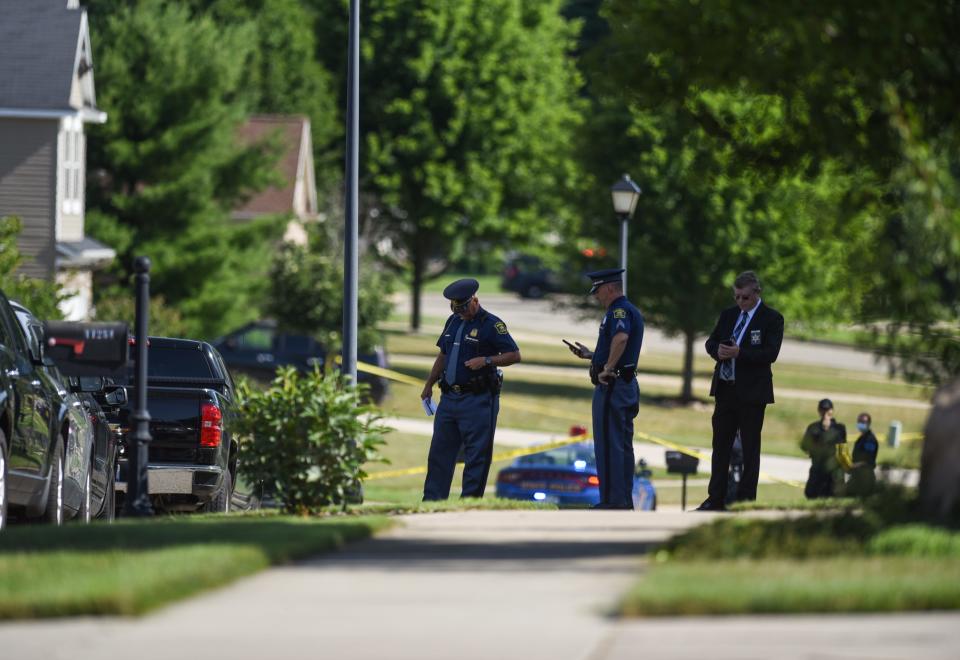 Michigan State Police and a member of the Eaton County Sheriff's Office at the scene of a deputy-involved shooting in the 11000 block of Jerryson Drive in Delta Township on Tuesday, July 14, 2020.