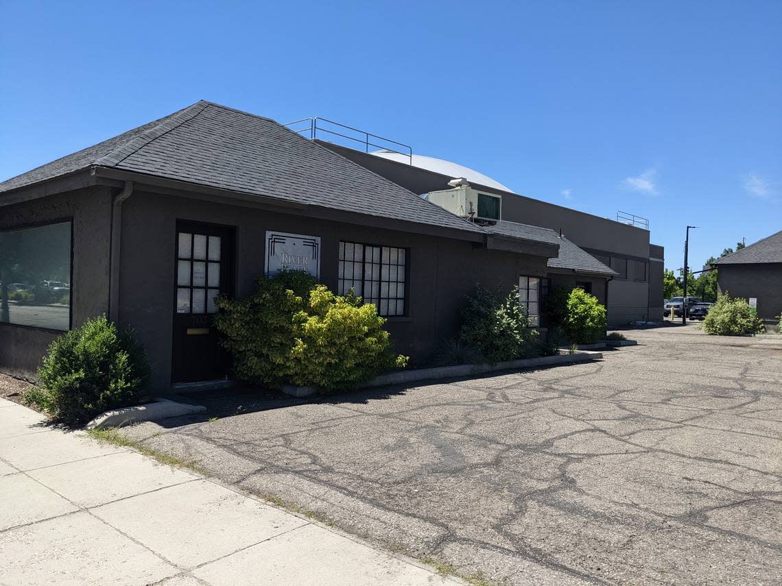 This photo shows the property at 703 S. 8th St. Boise’s urban renewal agency is considering buying the property that it classifies as underused. There are two one-story buildings and a parking lot on the 0.18-acre property.