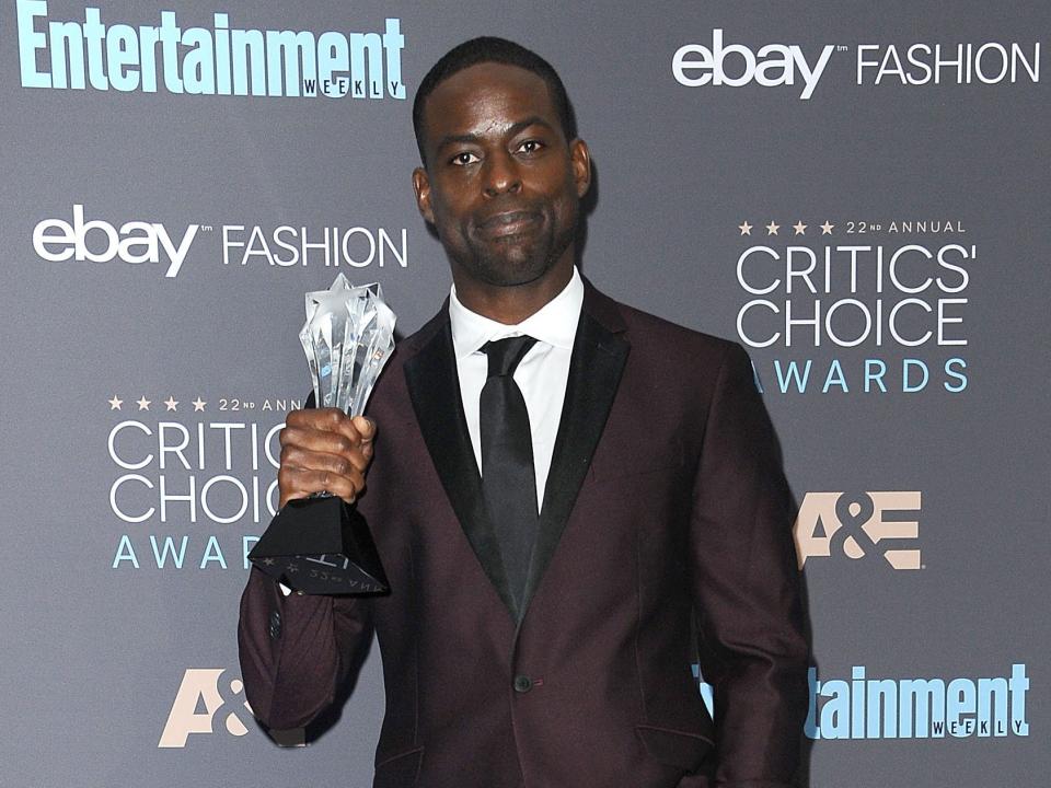 Actor Sterling K. Brown poses in the press room at the 22nd annual Critics' Choice Awards at Barker Hangar on December 11, 2016