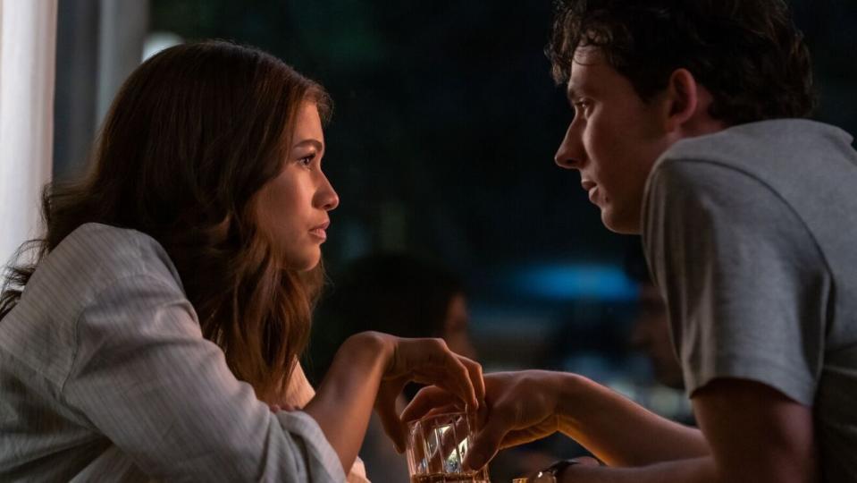 a man and a woman sitting at a table