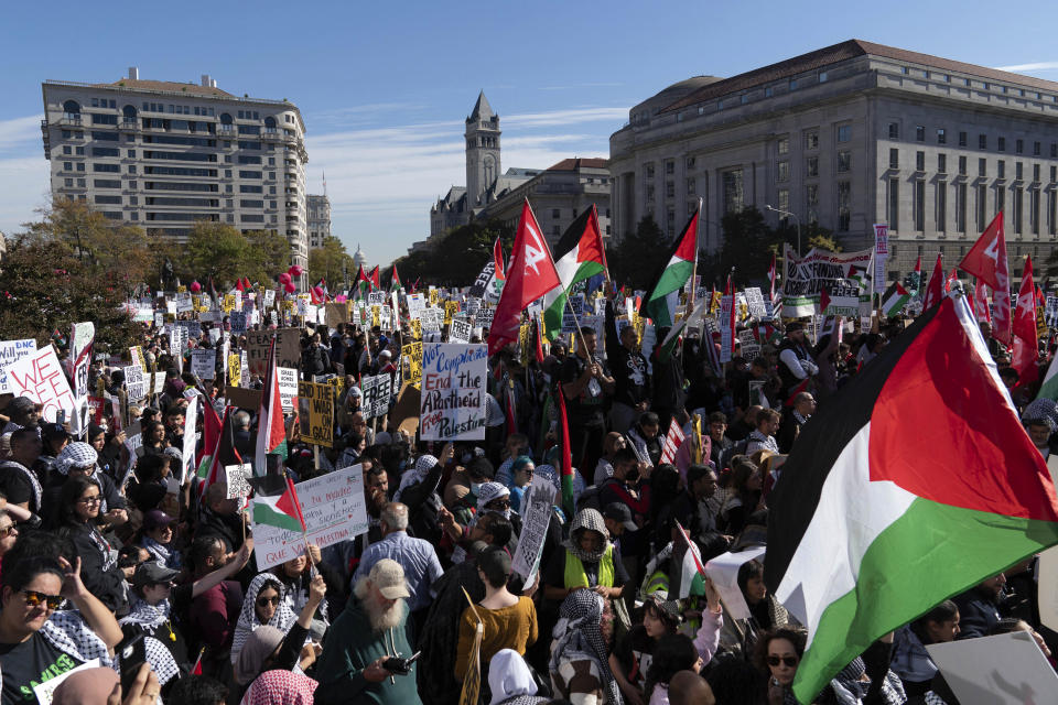With the U.S Capitol in the background, thousands of protesters rally during a pro-Palestinian demonstration at Freedom Plaza in Washington, Saturday, Nov. 4, 2023.(AP Photo/Jose Luis Magana)