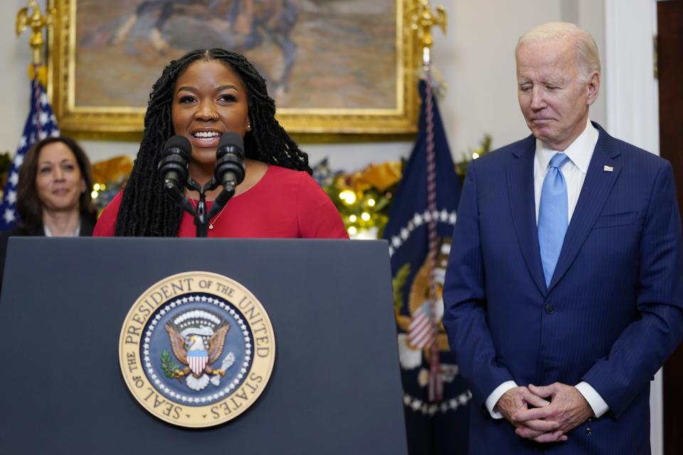 Cherelle Griner, wife of WNBA star Brittney Griner, speaks in the Roosevelt Room of the White House, Thursday, Dec. 8, 2022, in Washington, with President Joe Biden, right, and Vice President Kamala Harris. (AP Photo/Patrick Semansky)