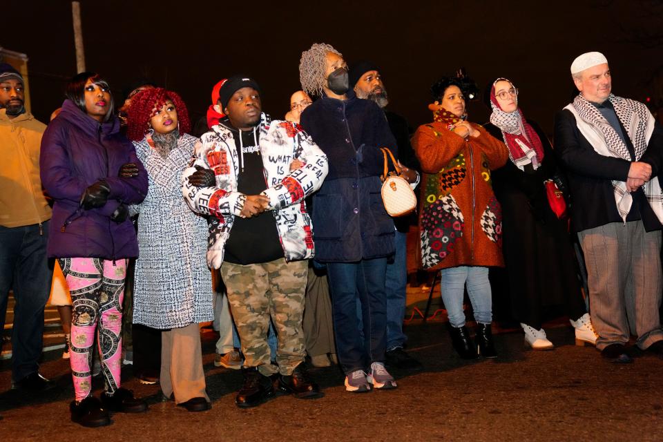 People stood outside the Masjid Muhammad-Newark, Wednesday night as they remembered Imam Hassan Sharif, who was shot and killed earlier in the day, January 3, 2024.