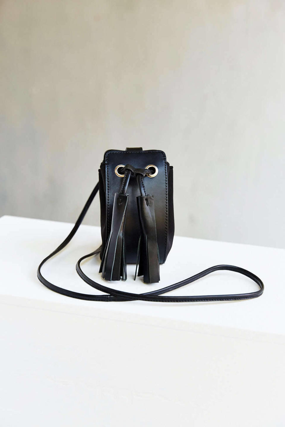 <p>Intentionally Blank Diet Mini Crossbody Bag, $129, <a href="http://www.urbanoutfitters.com/urban/catalog/productdetail.jsp?id=36521714&category=W_ACC_BAGS" rel="nofollow noopener" target="_blank" data-ylk="slk:urbanoutfitters.com;elm:context_link;itc:0;sec:content-canvas" class="link ">urbanoutfitters.com</a></p>