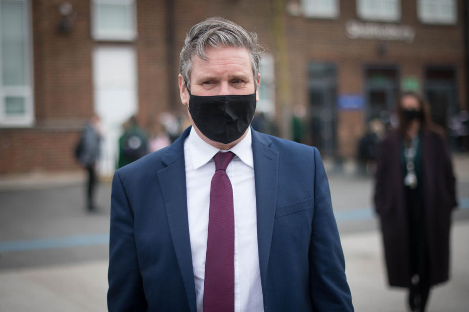 DAGENHAM, ENGLAND - MARCH 08: Labour leader Sir Keir Starmer during a visit to Sydney Russell School, Dagenham, where teachers and students are returning to the classroom after lockdown, on March 8, 2021 in Dagenham, England. The Labour Leader and Kate Green, shadow education secretary visited the Sydney Russell school in Dagenham as pupils returned to school. They called for the expansion of breakfast clubs to help children catch-up from 109 days of face-to-face learning lost during the third Coronavirus lockdown. This will form part of the launch of Labours 'Bright Future Taskforce' which aims to help children educational recovery from the Covid-19 Pandemic. (Photo by Stefan Rousseau - Pool/Getty Images)