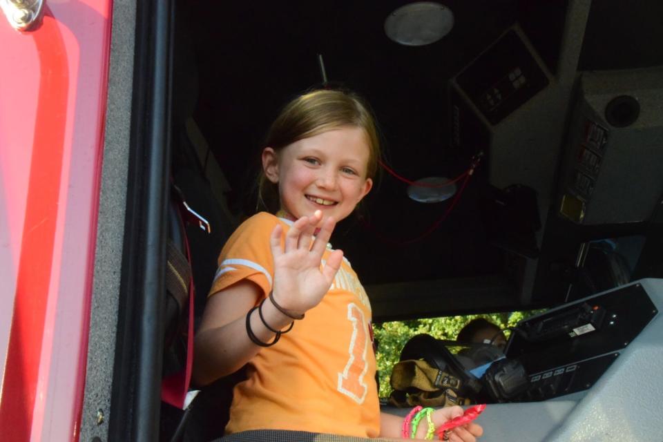 Parker Raths, 8, explores a fire engine at the 2019 carnival. Parker has moved on to middle school, but the Karns Fire Department will bring a truck to the Spring Fling April 14.