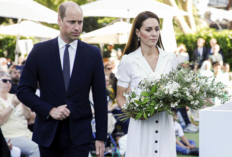Britain’s Prince William and Kate, Duchess of Cambridge lay a wreath during a multi-faith and wreath laying ceremony at base of Grenfell Tower in London, Tuesday, June 14, 2022. - Credit: AP
