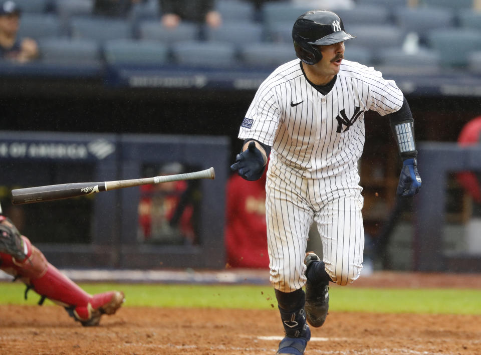 New York Yankees' Austin Wells tosses his bat after hitting a single during the eighth inning of a baseball game against the Arizona Diamondbacks, Monday, Sept. 25, 2023, in New York. (AP Photo/Noah K. Murray)
