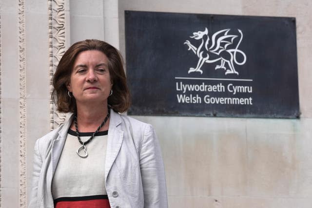 Eluned Morgan outside a Welsh Government building