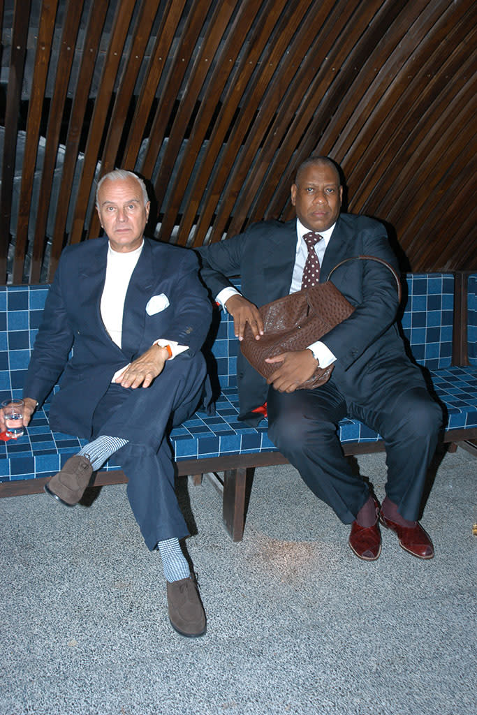 An unstoppable pair: Manolo Blahnik and André Leon Talley at a W Magazine party for Kate Moss in 2003. - Credit: Fairchild Archive/Penske Media