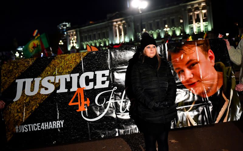 FILE PHOTO: Harry Dunn's mother Charlotte Charles poses in front of a banner outside the Buckingham Palace