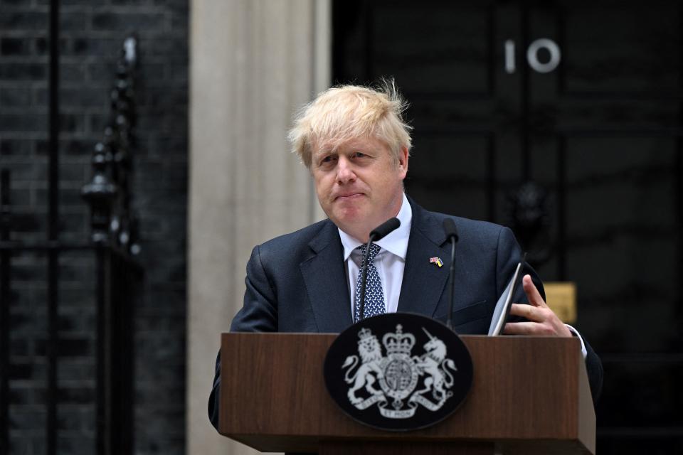 Britain's Prime Minister Boris Johnson makes a resignation statement in front of 10 Downing Street in central London on July 7, 2022.  / Credit: JUSTIN TALLIS / AFP