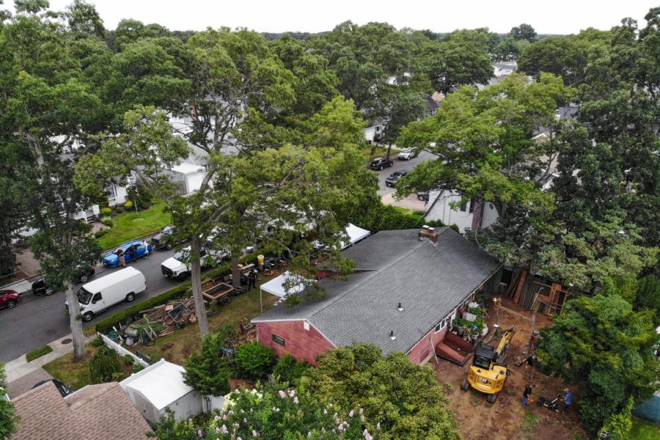 Authorities continue to work at the home of suspect Rex Heuermann (AP)