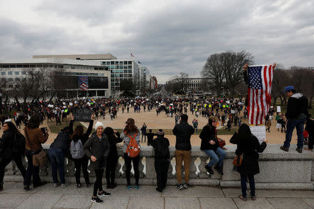 Activists march to the US Capitol to protest President Donald Trump's executive actions on immigration in Washington January 29, 2017. REUTERS/Aaron P. Bernstein