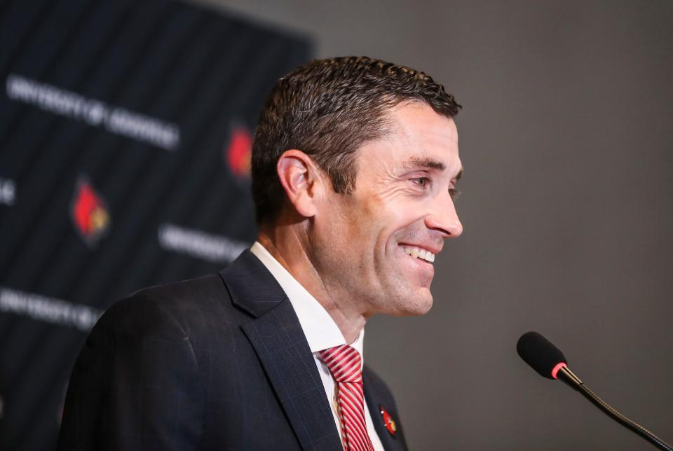 Josh Heird smiles while talking with the media after being formally introduced as permanent UofL athletic director on June 3, 2022.