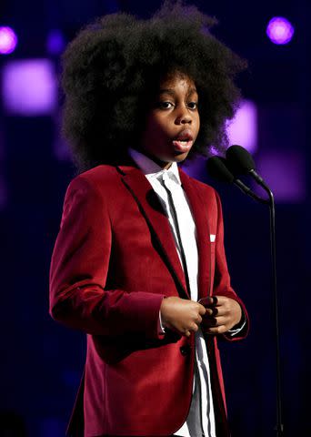 <p>Kevin Mazur/Getty</p> Raif-Henok Emmanuel Kendrick speaks onstage during the 61st Annual GRAMMY Awards on February 10, 2019 in Los Angeles, California.