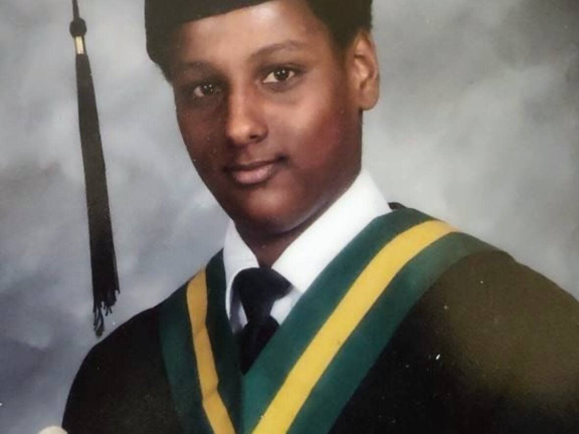 Abel Gime, 23, was found in a third floor unit at 245 Dunn Ave., a Toronto Community Housing building near Queen Street West. Officers and paramedics tried to save his life, but he was pronounced dead at the scene. (Toronto Police Service - image credit)