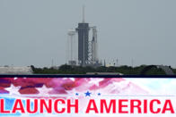 The SpaceX Falcon 9, with the Crew Dragon spacecraft on top of the rocket, sits on Launch Pad 39-A Monday, May 25, 2020, at Kennedy Space Center, Fla. Two astronauts will fly on the SpaceX Demo-2 mission to the International Space Station scheduled for launch on May 27. (AP Photo/David J. Phillip)