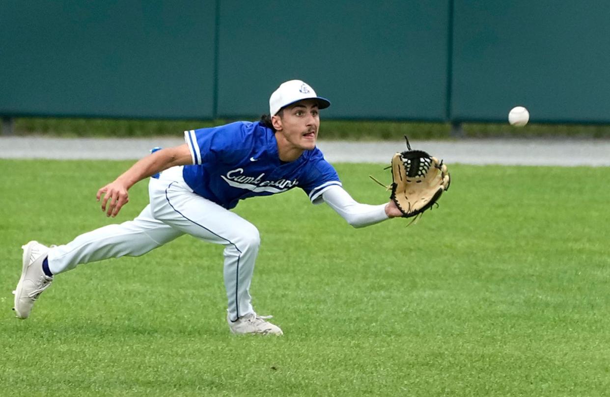 Cumberland outfielder Andrew Nocera dives for a fly ball for the out in the bottom of the second inning in a game last year.