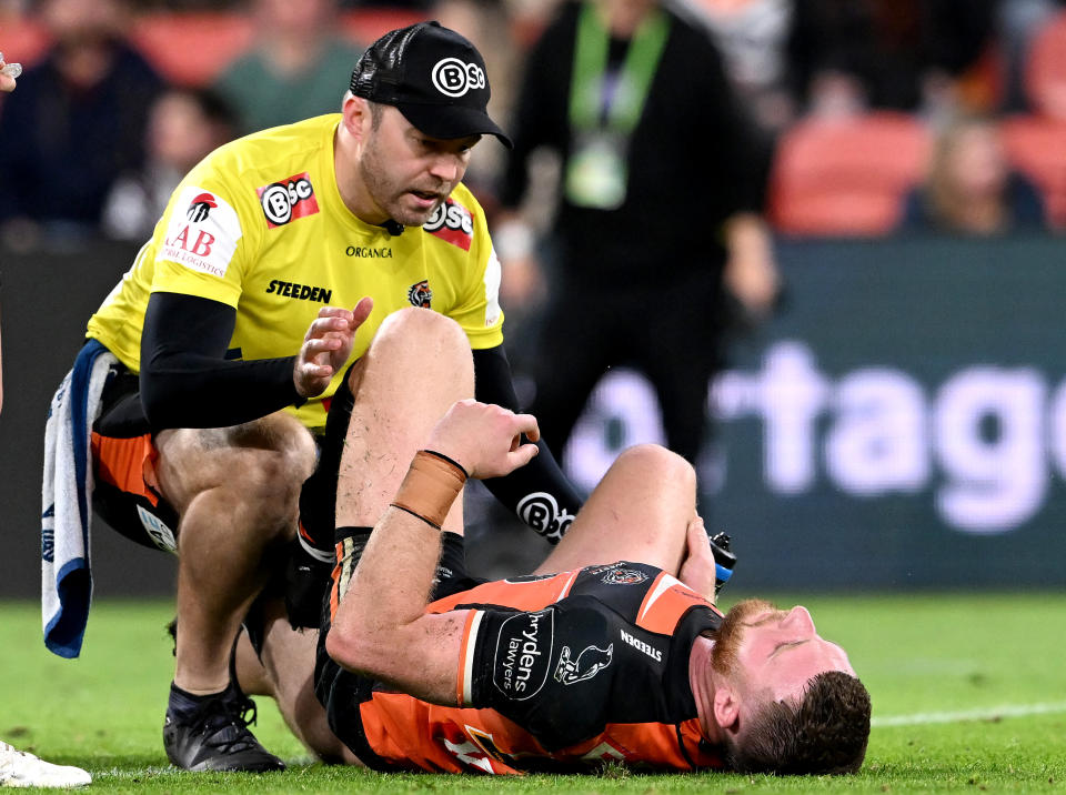 Jackson Hastings, pictured here after suffering a broken leg in a hip-drop tackle from Patrick Carrigan.