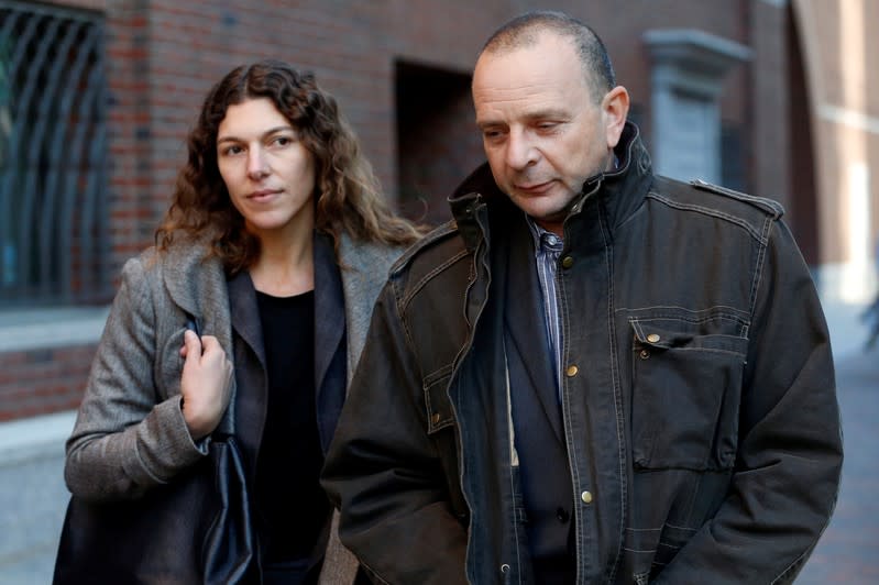 Test administrator Igor Dvorskiy leaves the federal courthouse in Boston