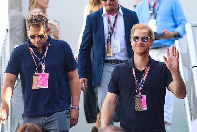 <p>Kym Illman/Getty</p> Prince Harry visits the U.S. Grand Prix