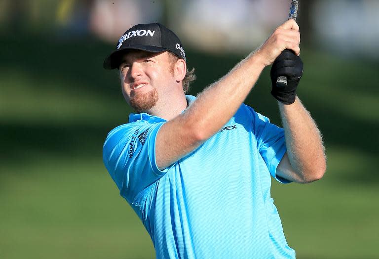 JB Holmes of the US plays his shot during the first round of the World Golf Championships-Cadillac Championship, at Trump National Doral Blue Monster Course in Florida, on March 5, 2015