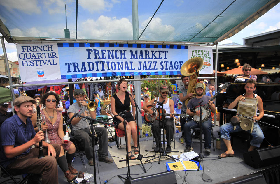 FILE - Tuba Skinny performs at the French Market Traditional Jazz Stage during the French Quarter Festival in New Orleans, April 13, 2014. Organizers on Tuesday, Jan. 31, 2023, announced a lineup of more than 270 acts for New Orleans' 40th annual French Quarter Festival, billed as Louisiana's largest free showcase of music, food and culture. (Kathleen Flynn/The Times-Picayune/The New Orleans Advocate via AP, File)