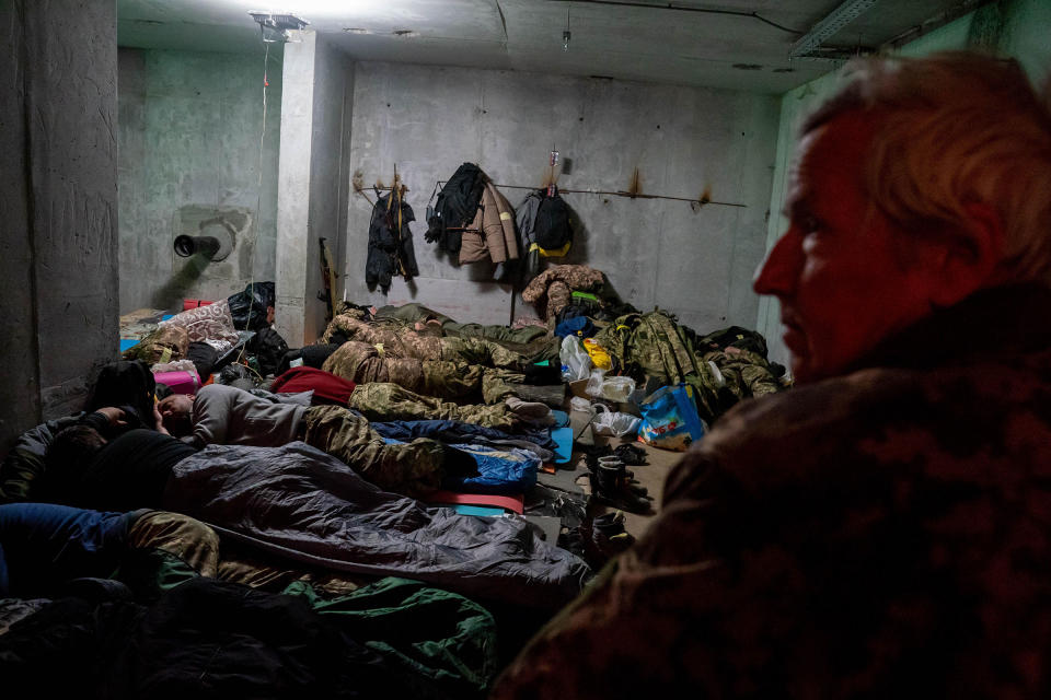 Members of the Territorial​ Defense Forces sleep in a basement near a frontline position on March 2.<span class="copyright">Alex Lourie—Redux</span>