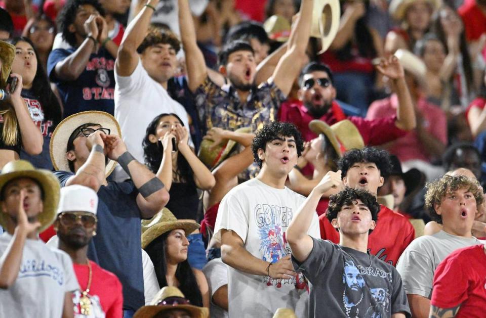 Fans cheer from the Fresno State student section during the Bulldogs’ 53-10 victory over Kent State Saturday, Sept. 23, 2023 in Fresno. ERIC PAUL ZAMORA/ezamora@fresnobee.com