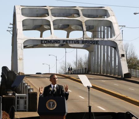 U.S. President Barack Obama speaks at the foot of the Edmund Pettus Bridge in Selma, Alabama March 7, 2015. REUTERS/Tami Chappell