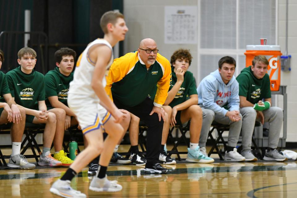 Sauk Rapids players look on from the bench during the first half of the game Tuesday, Dec. 7, 2021, at Sauk Rapids-Rice High School.