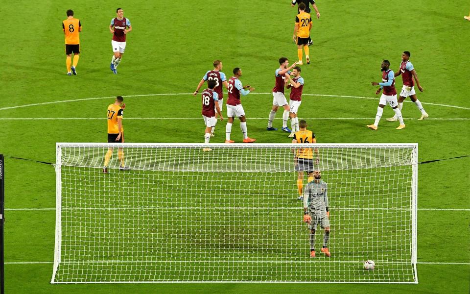 West Ham celebrate their fourth goal against Wolves - AP