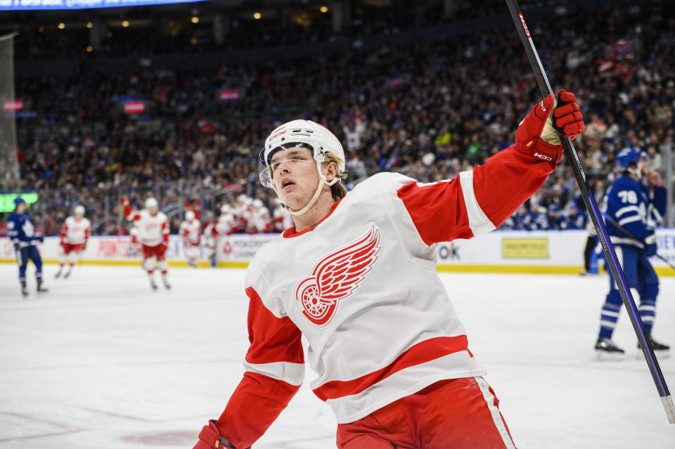 Detroit Red Wings right wing Jonatan Berggren celebrates after scoring on Toronto Maple Leafs goaltender Matt Murray during the first period of an NHL hockey game in Toronto on Sunday, April 2, 2023. (Christopher Katsarov/The Canadian Press via AP)