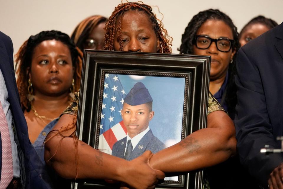 Chantemekki Fortson, mother of Roger Fortson, holds a photo of her son during a news conference (Copyright 2024 The Associated Press. All rights reserved.)