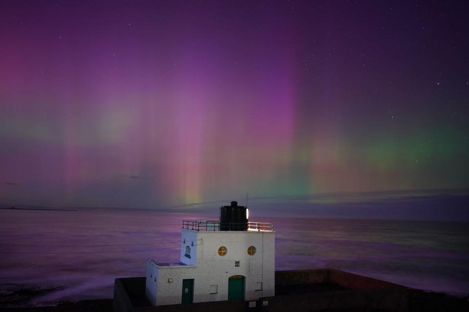 The aurora borealis, also known as the Northern Lights, could illuminate skies across the UK this weekend (Owen Humphreys/PA) (PA Wire)