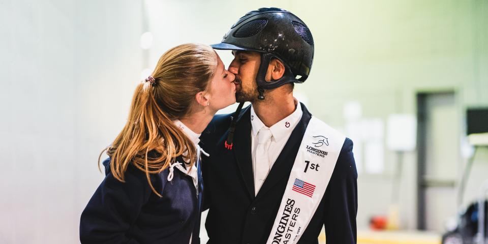 Nayel Nassar of Egypt kisses Jennifer Gates of USA after the Longines Grand Prix de New York, at the Longines Masters New York 2019, at NYCB Live.