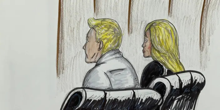 A court sketch shows Todd and Julie Chrisley listen in court as their accountant is sentenced