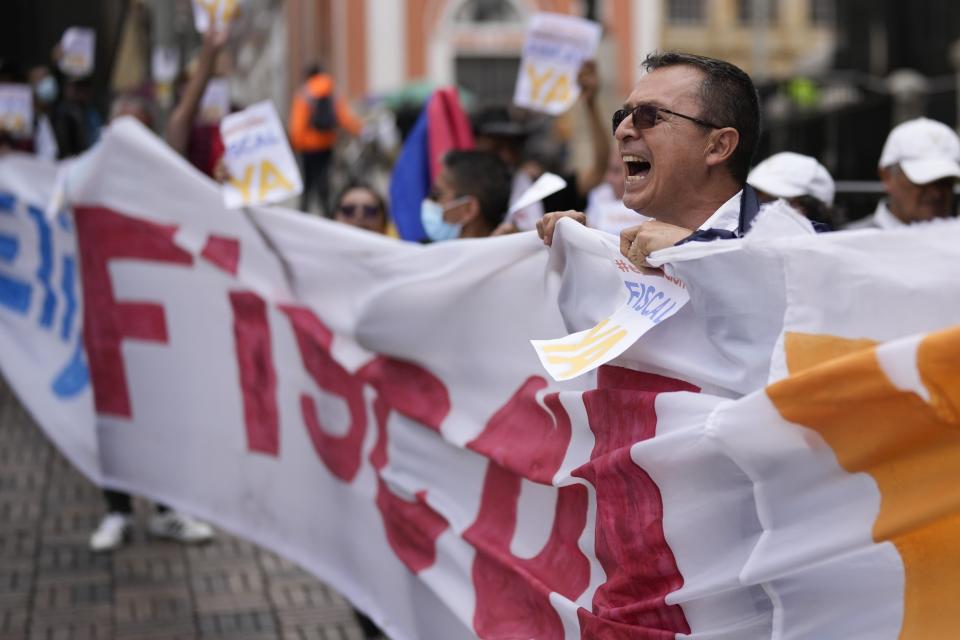 Supporters of Colombian President Gustavo Petro rally outside the Supreme Court in Bogota, Colombia, Thursday, Feb. 22, 2024. Colombia's Supreme Court is expected to elect a new prosecutor. (AP Photo/Fernando Vergara)