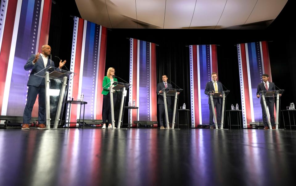 Candidates, from left, Lt. Gov. Mandela Barnes, state Treasurer Sarah Godlewski, Milwaukee Bucks executive Alex Lasry, Outagamie County Executive Tom Nelson and nonprofit executive Steven Olikara during the Democratic U.S. Senate debate at Marquette University's Varsity Theatre in Milwaukee on Sunday, July 17, 2022. It was the first televised debate of Wisconsin's campaign season before the Aug. 9 primary.