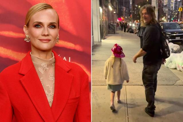 Diane Kruger beams at her daughter Nova, four, after she gives money to a  homeless person while out and about in Manhattan