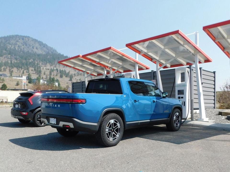  A Rivian R1T charging at an Electrify Canada station in Merritt, B.C.