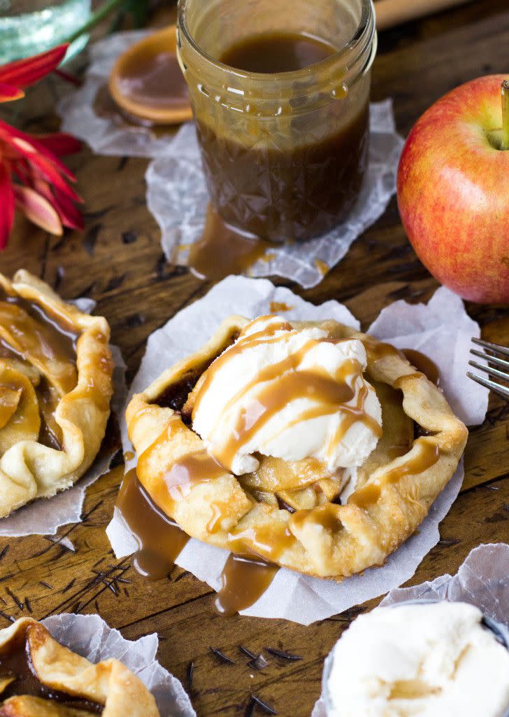 <p>Don't worry about having to share dessert. The best thing about these sweet treats is that everyone can have their own. And these mini caramel apple galettes are a perfect alternative to pie!</p><p><strong>Get the recipe at <a rel="nofollow noopener" href="https://sugarspunrun.com/mini-caramel-apple-galettes/" target="_blank" data-ylk="slk:Sugar Spun Run.;elm:context_link;itc:0;sec:content-canvas" class="link ">Sugar Spun Run.</a></strong></p>