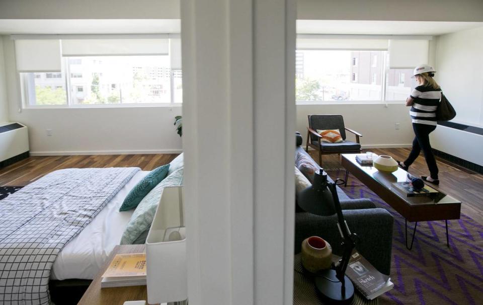 Dianne Dillingham tours one of the 32 new 700 square-foot, one-bedroom apartments available for residential living at the Owyhee in Downtown Boise.