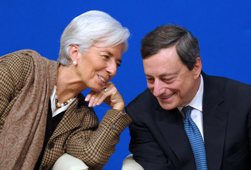 International Monetary Fund (IMF) Managing Director Christine Lagarde talks with European Central Bank (ECB) president Mario Draghi during the "Treasury Talks" at French Economy and Finances Ministry on November 30, 2012 in Paris. AFP PHOTO ERIC PIERMONT        (Photo credit should read ERIC PIERMONT/AFP/Getty Images)